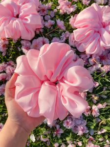 Pink oversized silk scrunchies